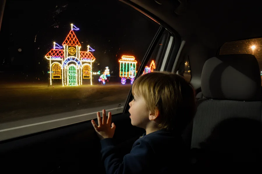 Child in a car seeing lights